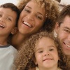 Lifestyle photo of a family smiling together